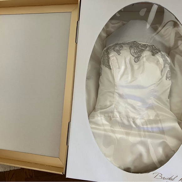 Size 12, hand-beaded wedding gown. Worn once and in a preservation box. - Picture 2 of 9